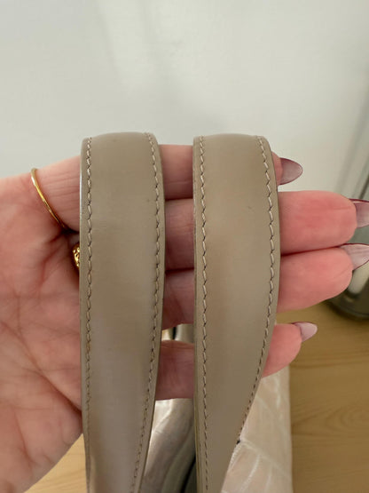 AUTHENTIC Chanel Travel Line tote bag in a blush pink nylon canvas with beige leather trim and straps