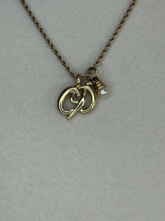 Authentic Vintage Christian Dior “CD” with drop pearl