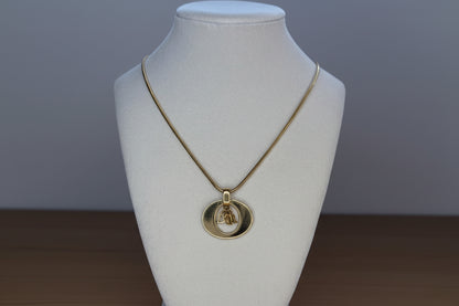 Christian Dior “Dior” Charm Circle Necklace
