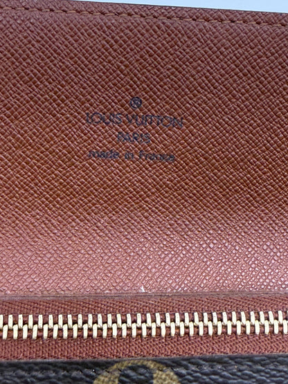 Louis Vuitton  Monogram Accordion Wallet with non branded wristlet chain