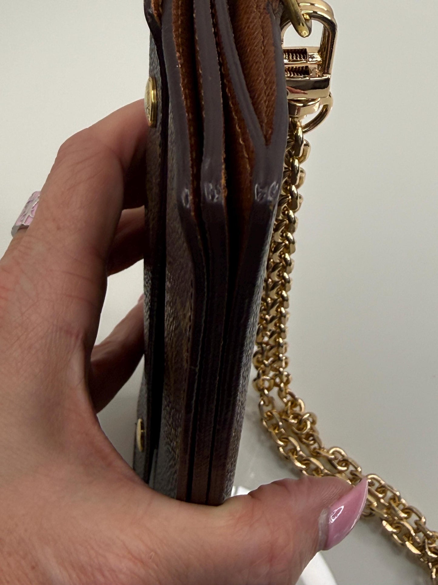 Louis Vuitton  Monogram Accordion Wallet with non branded wristlet chain