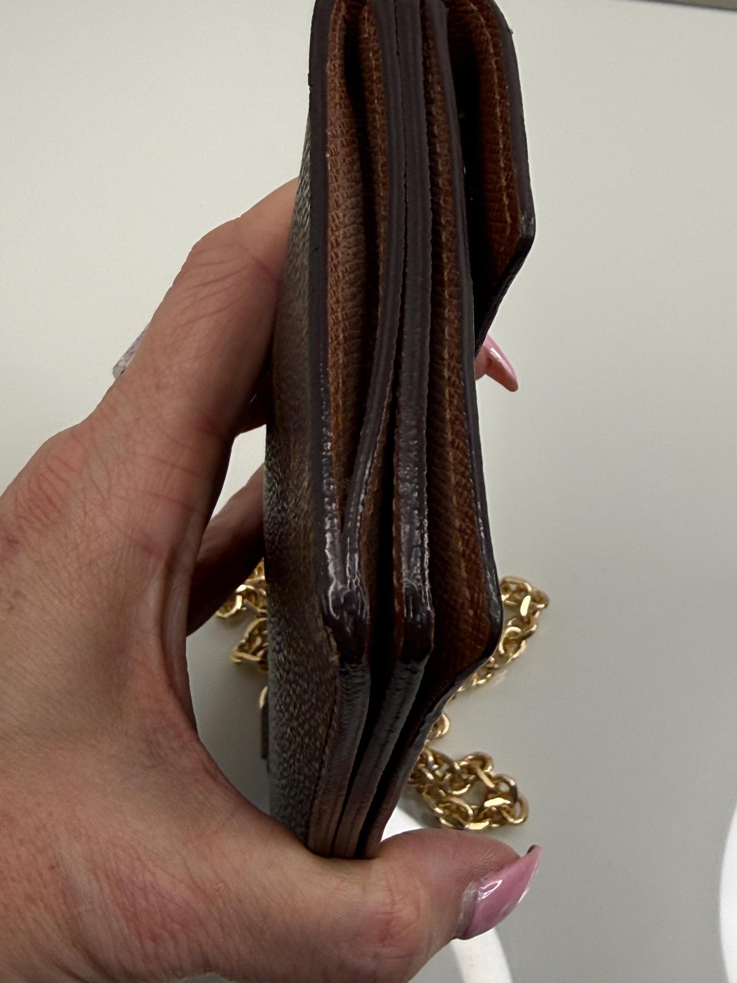 Louis Vuitton  Monogram Accordion Wallet with non branded wristlet chain