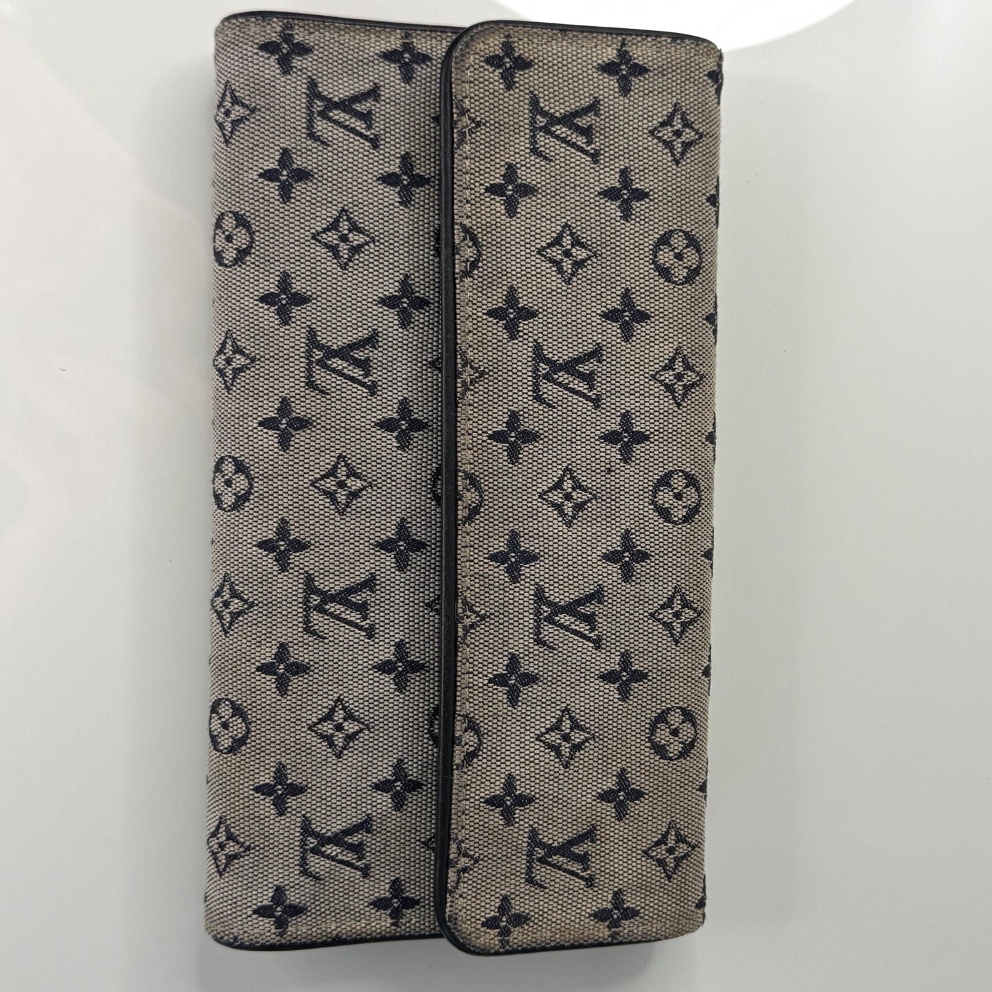 Louis Vuitton Monogram Mini Lin Blue Porte Tresor International