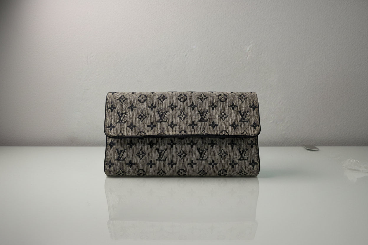 Louis Vuitton Monogram Mini Lin Blue Porte Tresor International
